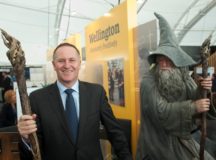 Blurring the Boundaries: A  brooding Gandalf watches on as former City of London and Wall Street Banker John Key grins from ear to ear in an image that escapulates the banking industry's make-believe credit conjuring tricks.